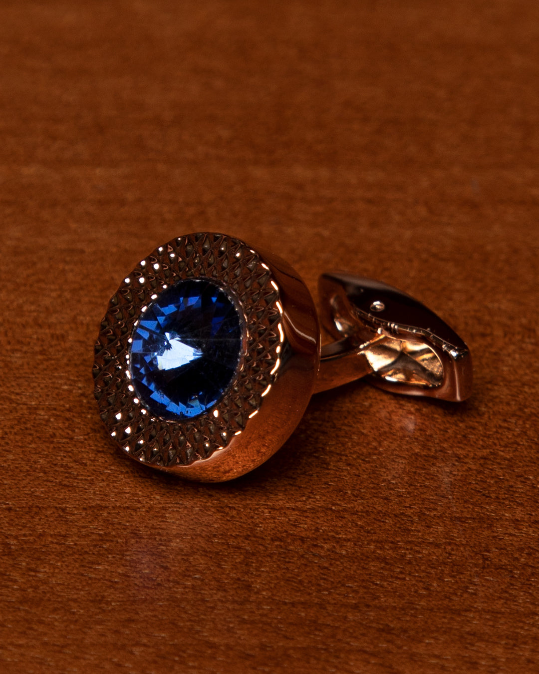 Gold Colored Cufflinks with Blue Stone Set