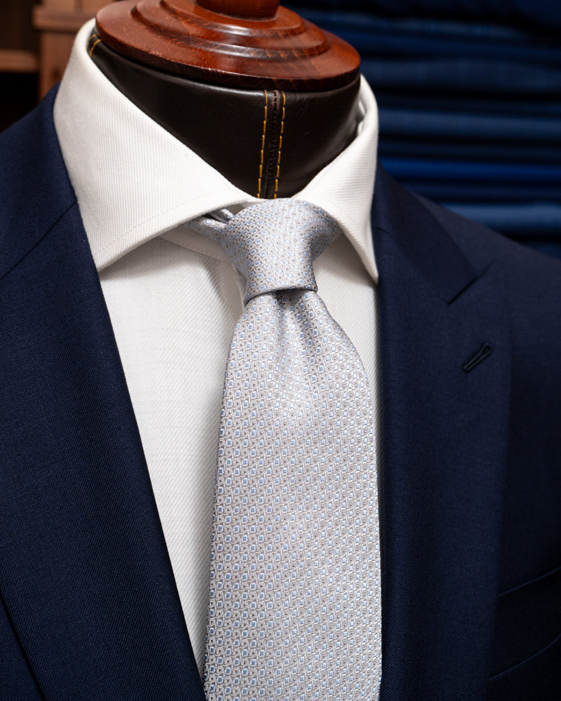 Abito Bernini Blu Scuro Fodera Fantasia: Eleganza Originale in Lana Quattro Stagioni.