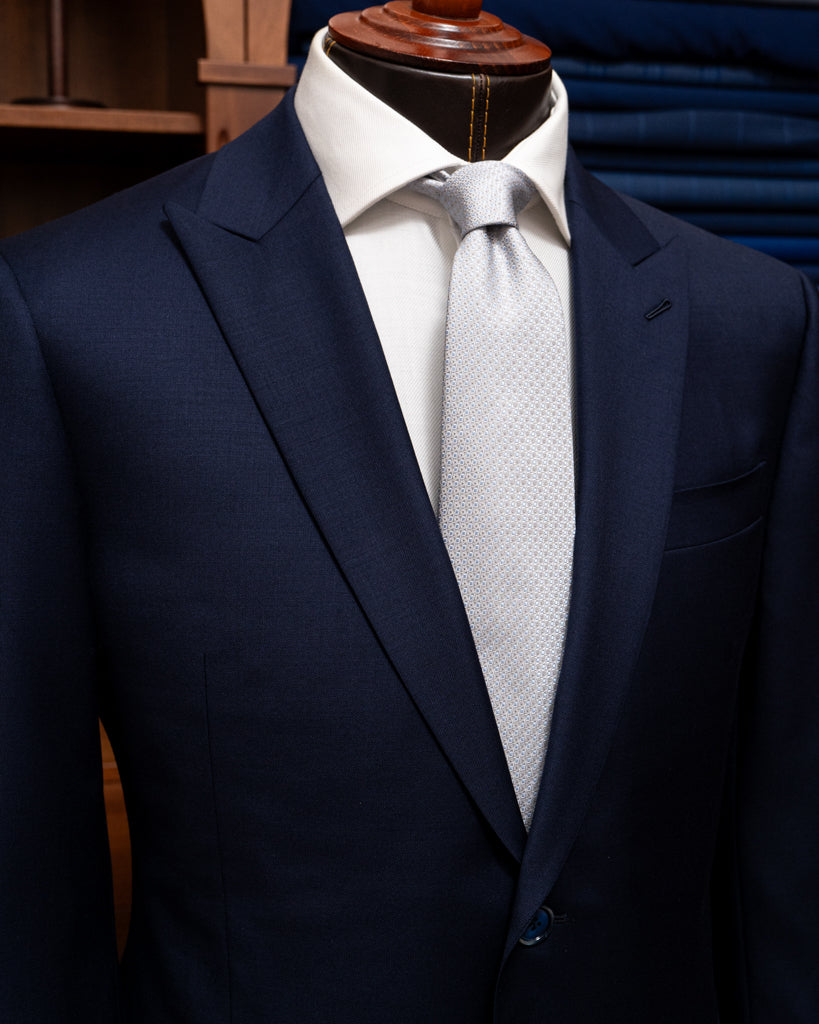 Abito Bernini Blu Scuro Fodera Fantasia: Eleganza Originale in Lana Quattro Stagioni.