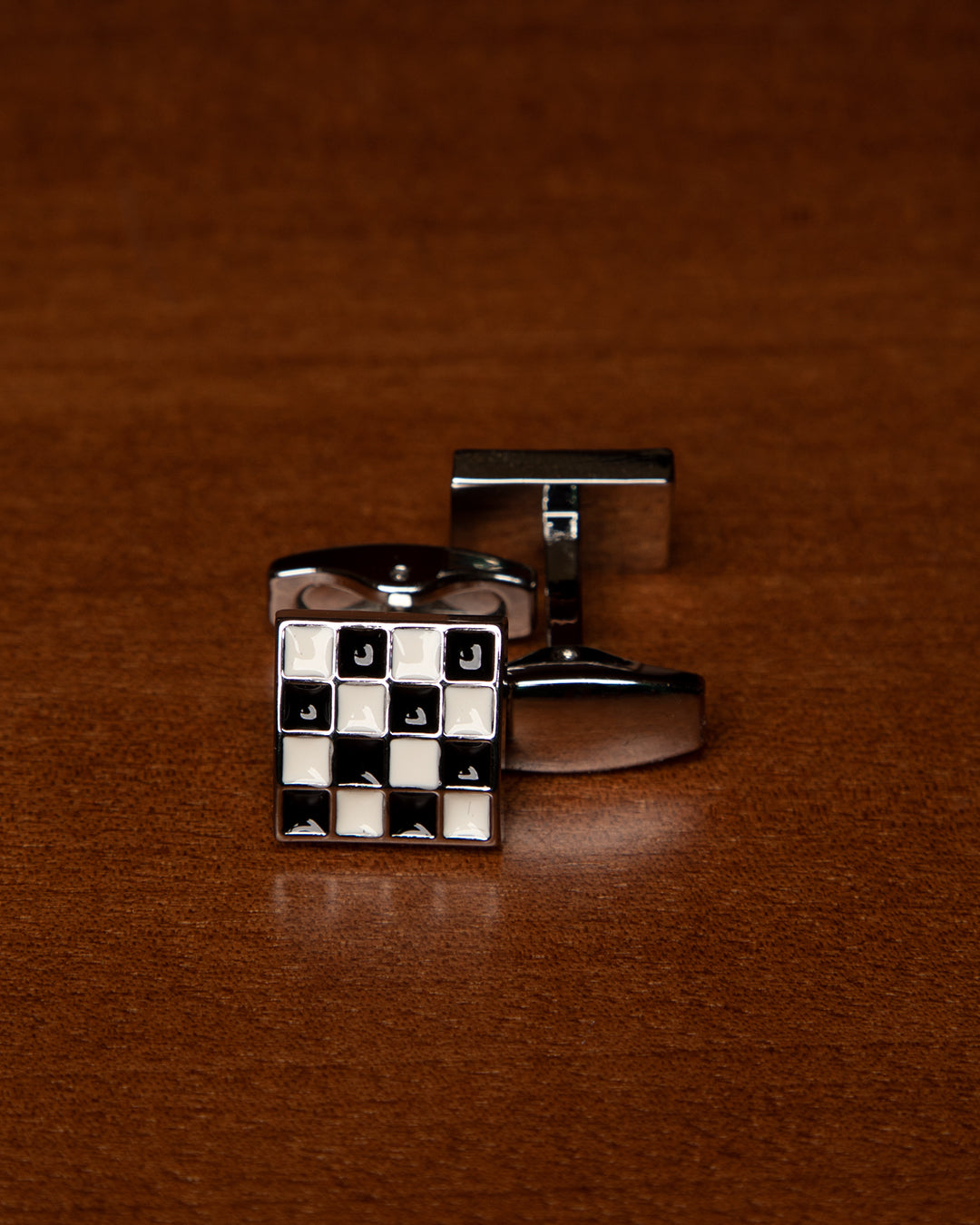 Silver-Colored Cufflinks with Black and White Checkered Pattern