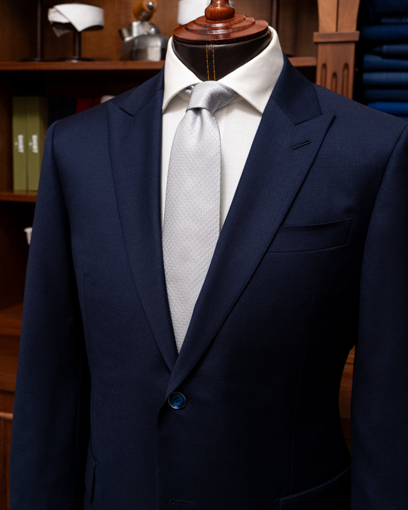 Abito Bernini Blu Scuro Fodera Fantasia: Eleganza Originale in Lana Quattro Stagioni.