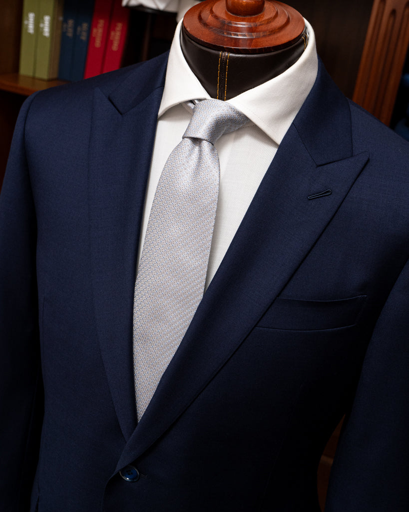 Abito Bernini Blu Scuro Fodera Fantasia: Eleganza Originale in Lana Quattro Stagioni.