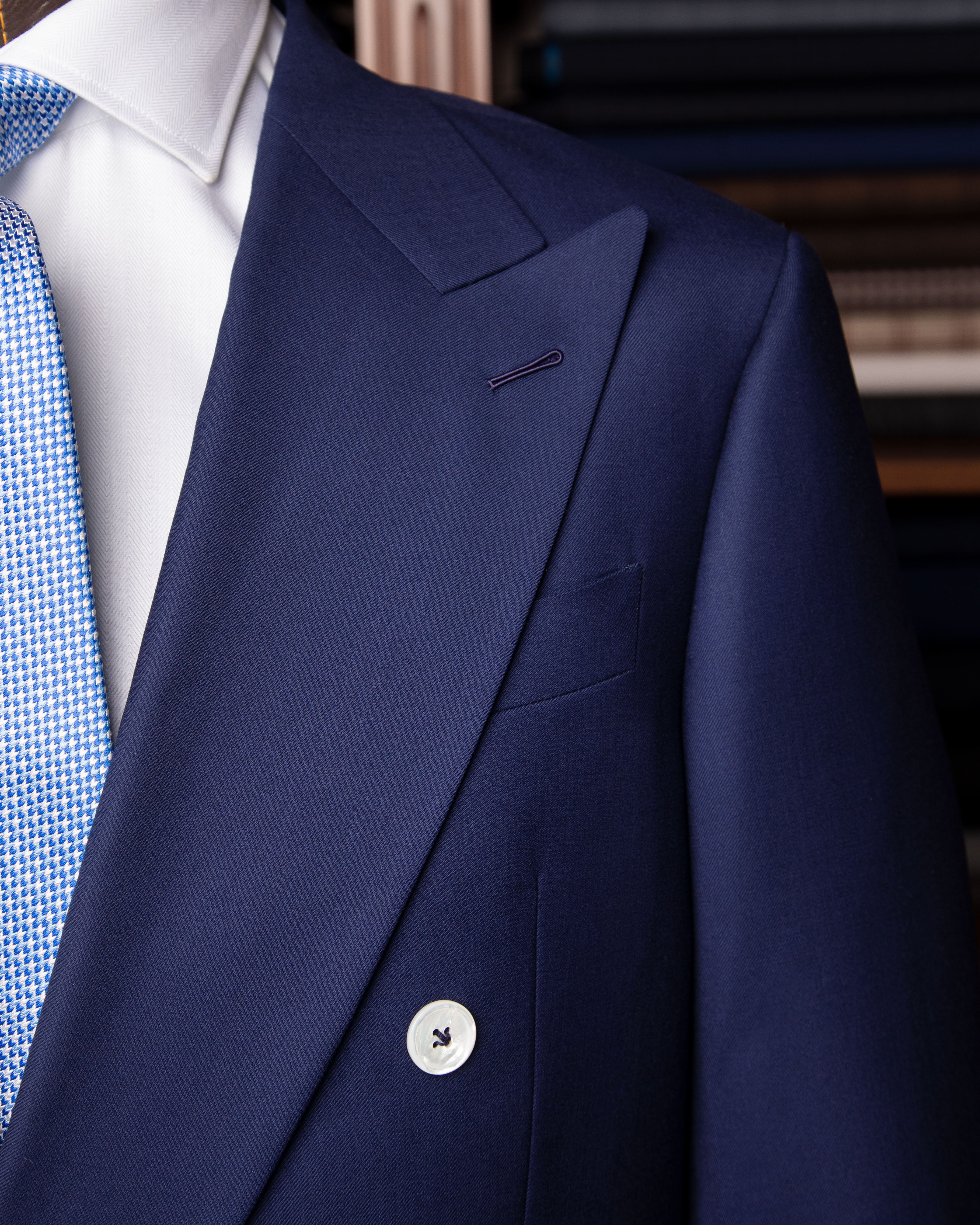 Perugino Blue Suit with White Mother of Pearl Buttons