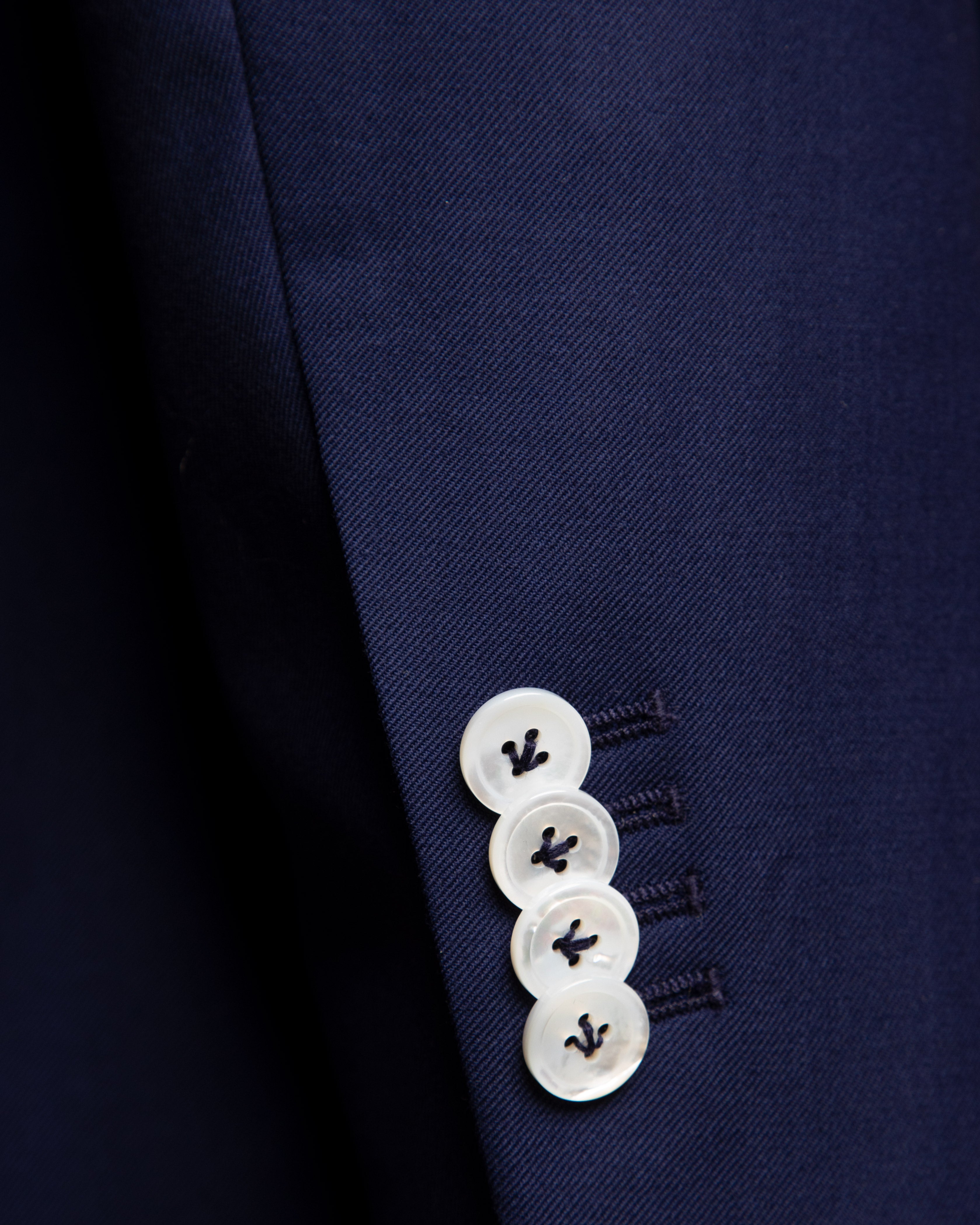 Perugino Blue Suit with White Mother of Pearl Buttons