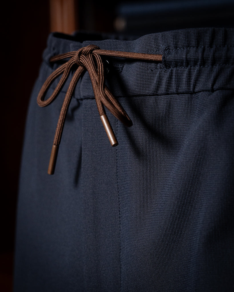 Trousers with Blue Laces